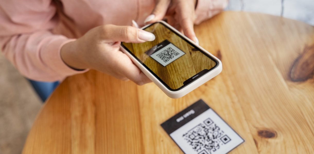 close-up-hands-holding-smartphone Brickcode